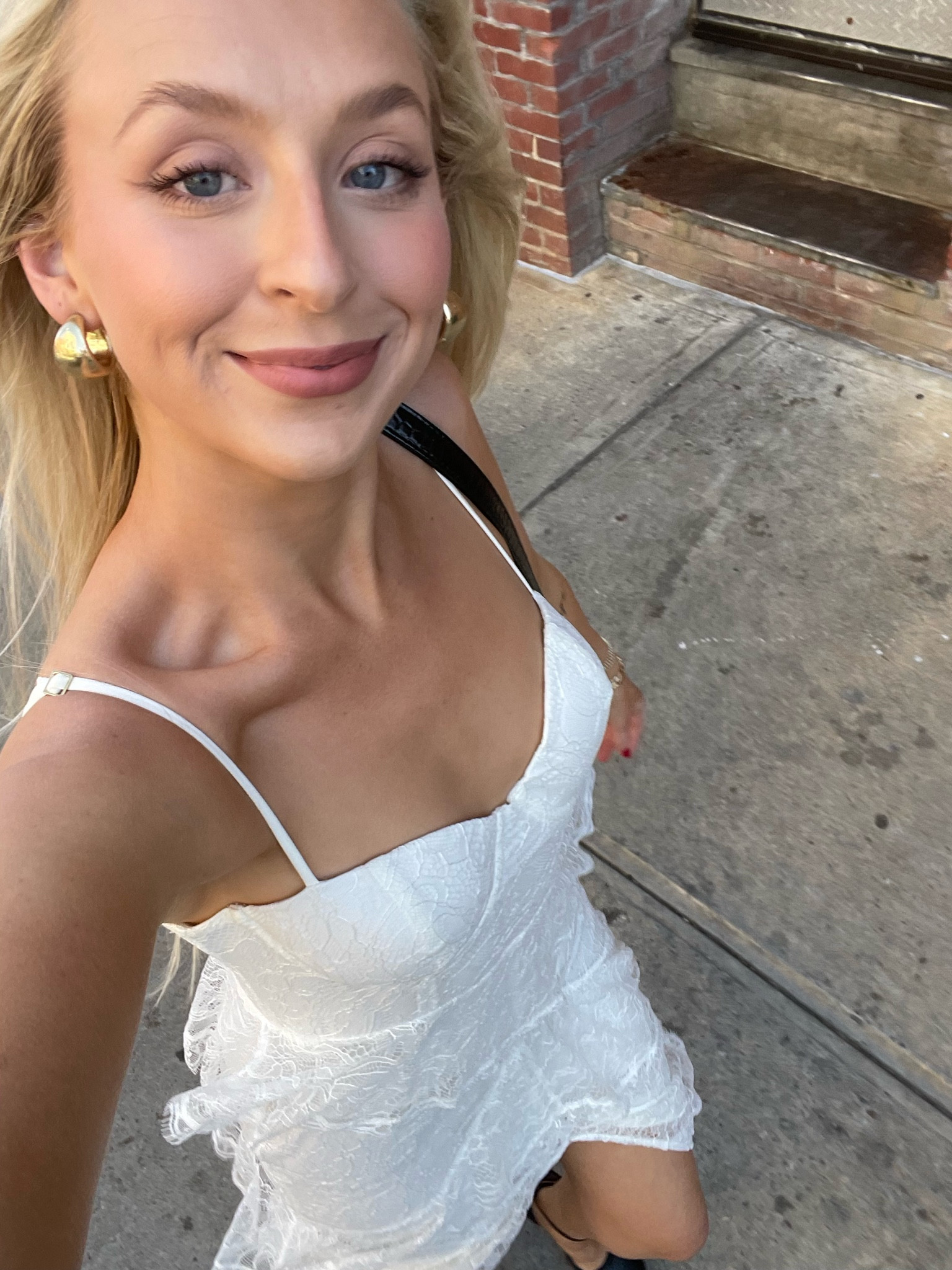 What I wore to a black tie wedding in New York - wearing a size small! I also wore this last year for my wedding rehersal dinner 🤍 

Revolve wedding guest dress, NYC outfit, white dress, bridal dress, lace detail, tiered maxi dress