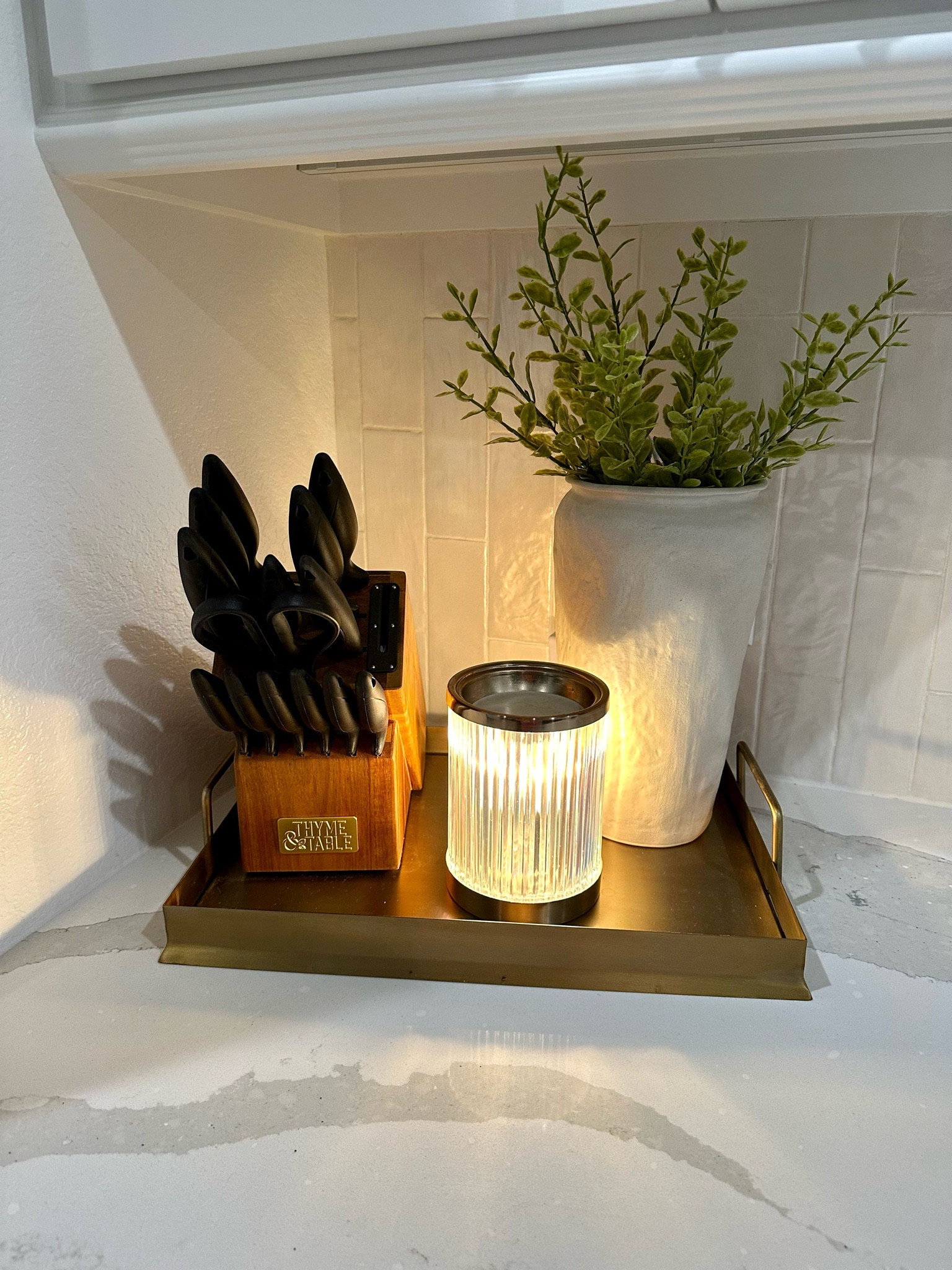 Fluted gold wax warmer, brass tray, gold knife set. 

#LTKFind #LTKunder50 #LTKhome