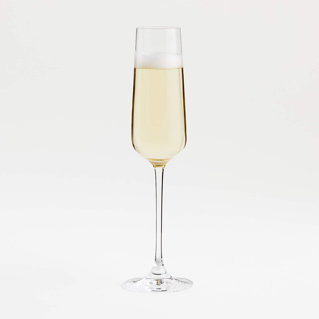 Oversized Hip Champagne Glass Flute + Reviews | Crate & Barrel | Crate & Barrel