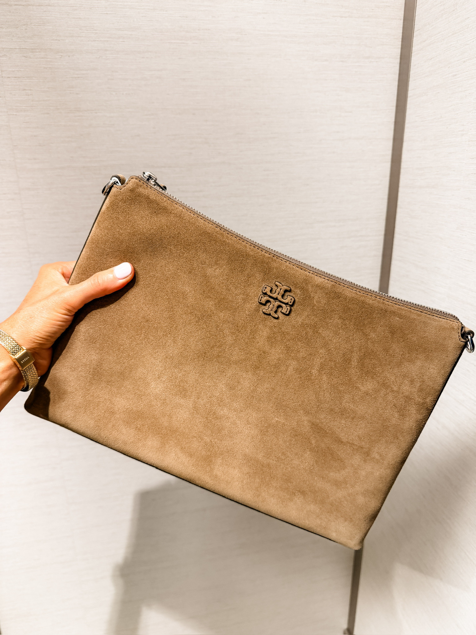 This faux suede designer purse is a crossbody bag! It can also be worn as a shoulder bag, and you can even remove the straps! You could use it as a pouch in a tote bag without the straps if you wanted to! On sale now for the Nordstrom Anniversary sale!

Loverly Grey, Nordstrom anniversary sale, NSALE, faux suede purse, Tory burch, designer purse, shoulder purse, crossbody 

 #LTKSeasonal #LTKSaleAlert