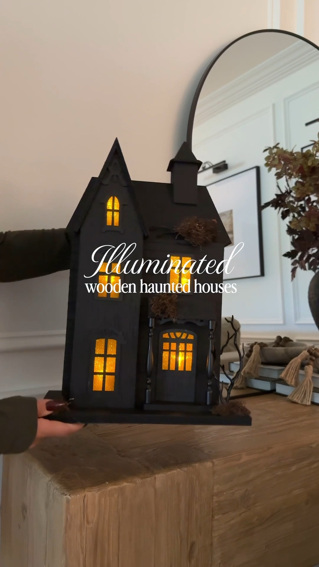 They’re back for the 2026! There’s some slight variations, but this is one of my favorite purchases from @Target 

These wooden haunted houses come in a few few sizes and illuminate with the touch of a button. Ordering tip: I ordered mine online last year for local pick up to avoid possible damage during shipping. 🖤

#LTKSeasonal #LTKHome #LTKSaleAlert
