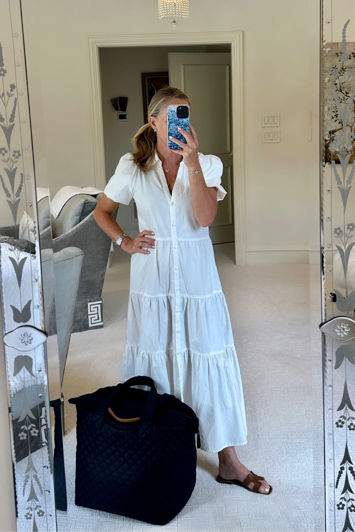 I major shout out for my new favorite travel dress! Yes, a white dress! I wore this dress for our 60 hours of travel home from Tanzania. As you can see, it still looks fresh and amazing! The fabric is lightweight and virtually wrinkle resistant. 
I got something on the skirt and was able to rinse it out with a little soap and water and hang it to dry on our overnight at the Doha airport hotel! 

It comes in so many different colors, and is a must have! 
Fits TTS

Also, linking the best travel tote, my MZ Wallace metro deluxe tote in large

#LTKItBag #LTKStyleTip #LTKTravel