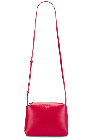 KHAITE Lina Medium Crossbody Bag in Rebel - Red. Size all. | FWRD 