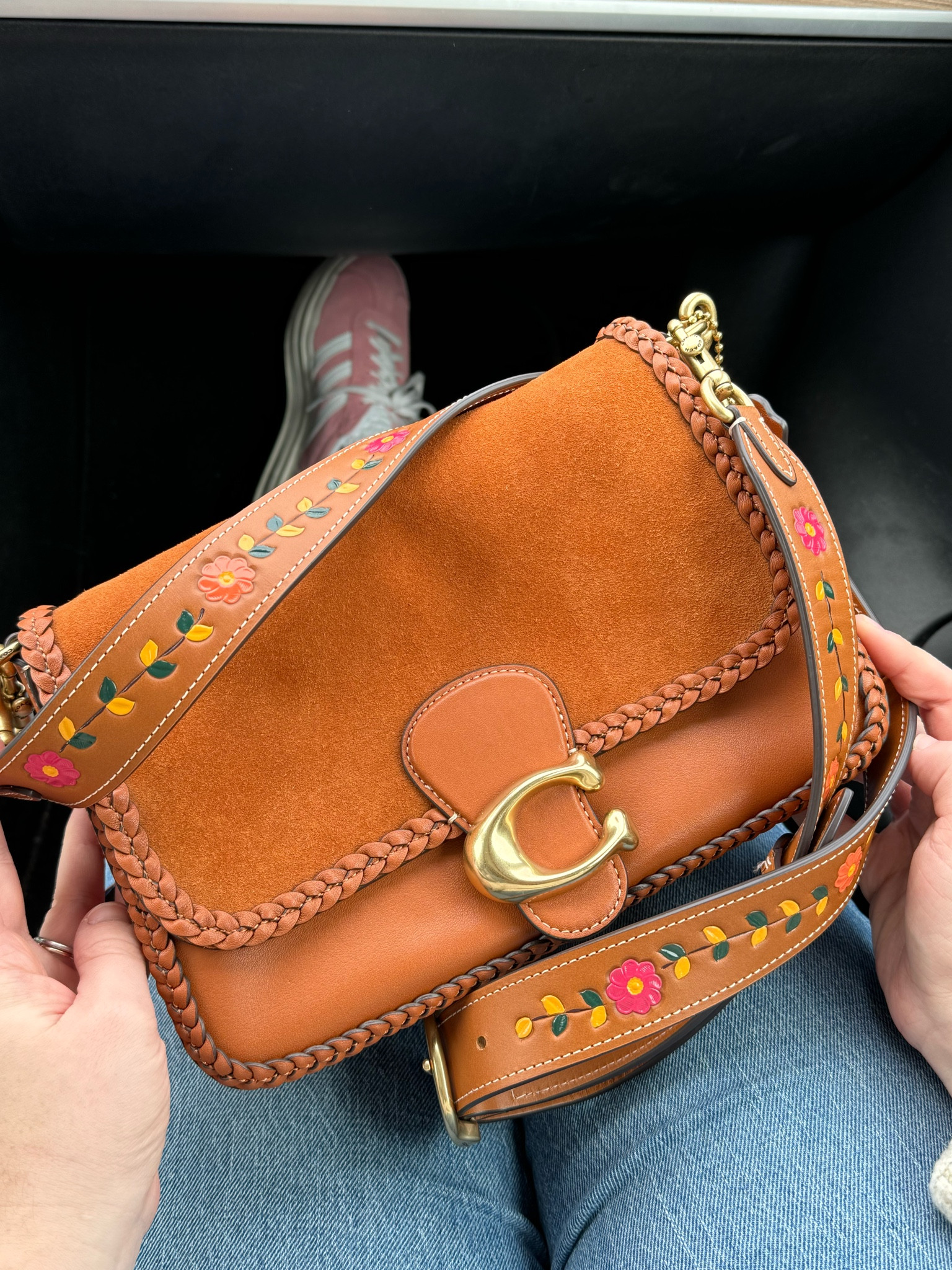 Brown coach purse with floral a embroidered strap 

#LTKitbag