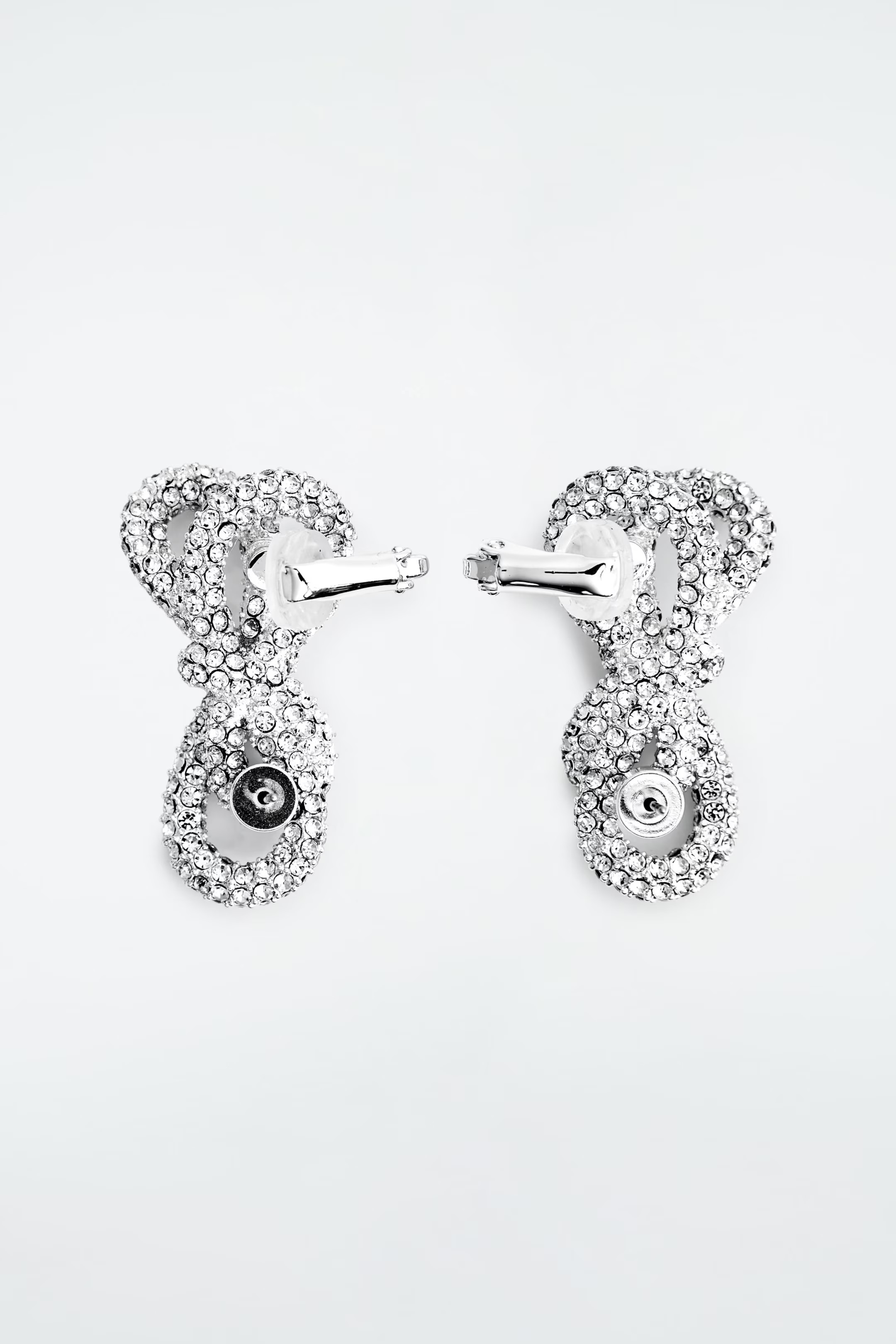 KNOTTED BOW CRYSTAL CLIMBER EARRINGS - SILVER | COS (EU)
