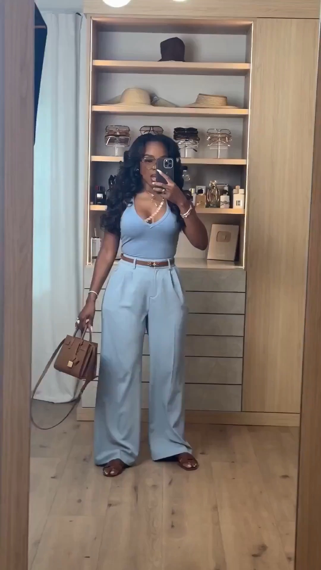 Scroll to shop! ✨ Everything from this look is linked below. 👇🏽

Proof that tonal dressing always looks expensive. 🤍 This soft blue fitted V-neck top paired with matching wide-leg trousers creates the prettiest effortless monochromatic moment. The brown belt, structured bag + sandals add the perfect neutral contrast.

light blue outfit, monochromatic outfit women, blue wide leg trousers, high waisted wide leg pants, light blue trousers outfit, fitted v neck top, blue top and pants outfit, tonal dressing women, classy casual outfit, elevated everyday outfit, chic brunch outfit, sophisticated casual style, petite wide leg pants outfit, neutral accessories outfit, spring to fall transition outfit, kirasfashionfinds

Wearing: Size Small/4 | 5’4” | 140 lbs | 34D-27-40

Download the FREE LTK app & follow @kirasfashionfinds

#LTKPetite #LTKWorkwear #LTKSeasonal