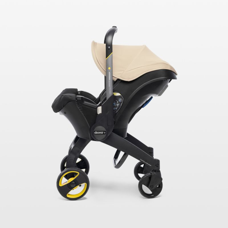 Doona Sahara Sand Compact Infant Car Seat & Stroller with Base + Reviews | Crate & Kids | Crate & Barrel
