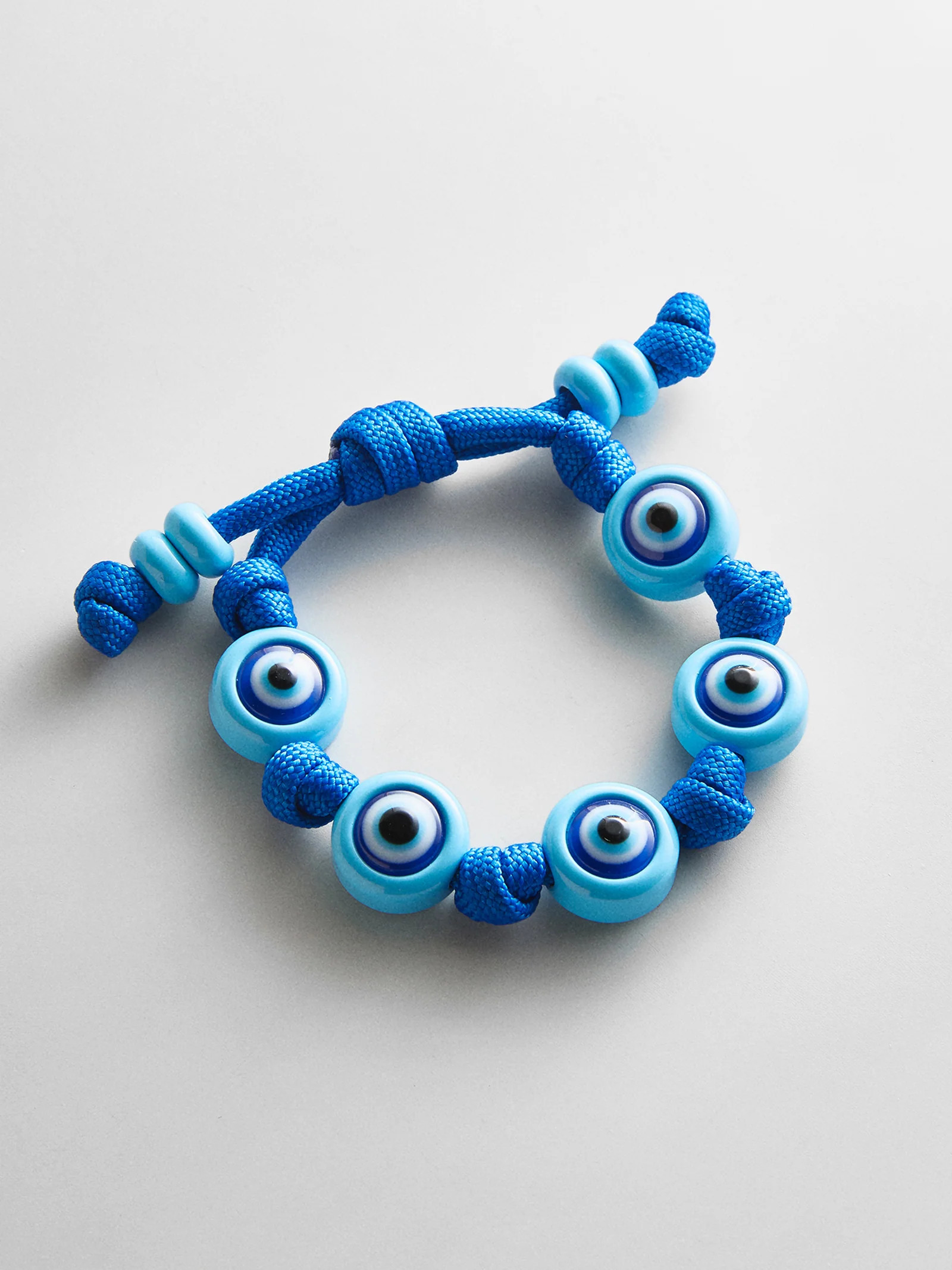 Knotty Good Eye Cord Bracelet  - Aqua | BaubleBar