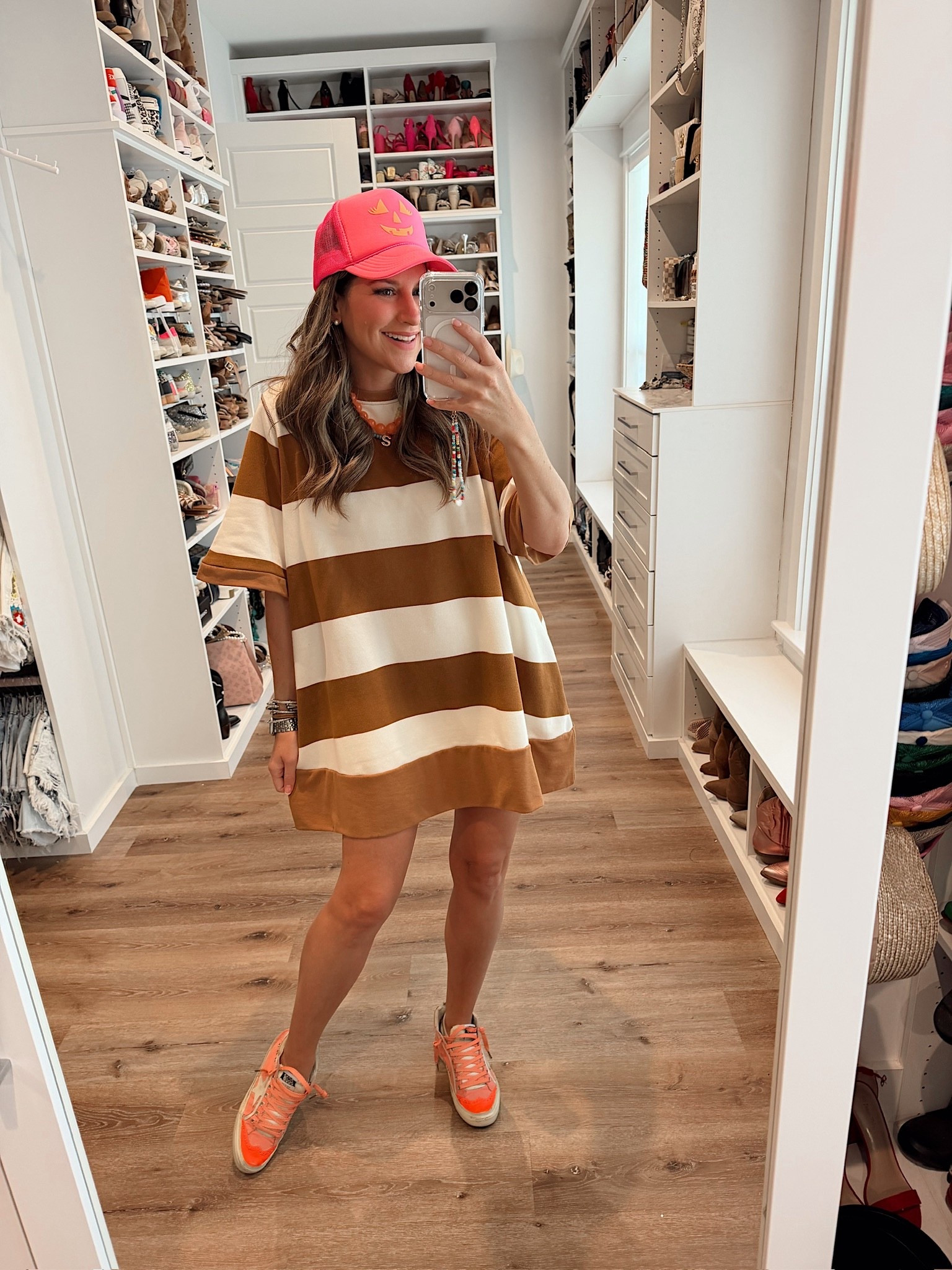 In a medium t shirt dress, hat, necklaces and sneakers - fits tts. 

#LTKStyleTip #LTKFindsUnder50 #LTKSeasonal
