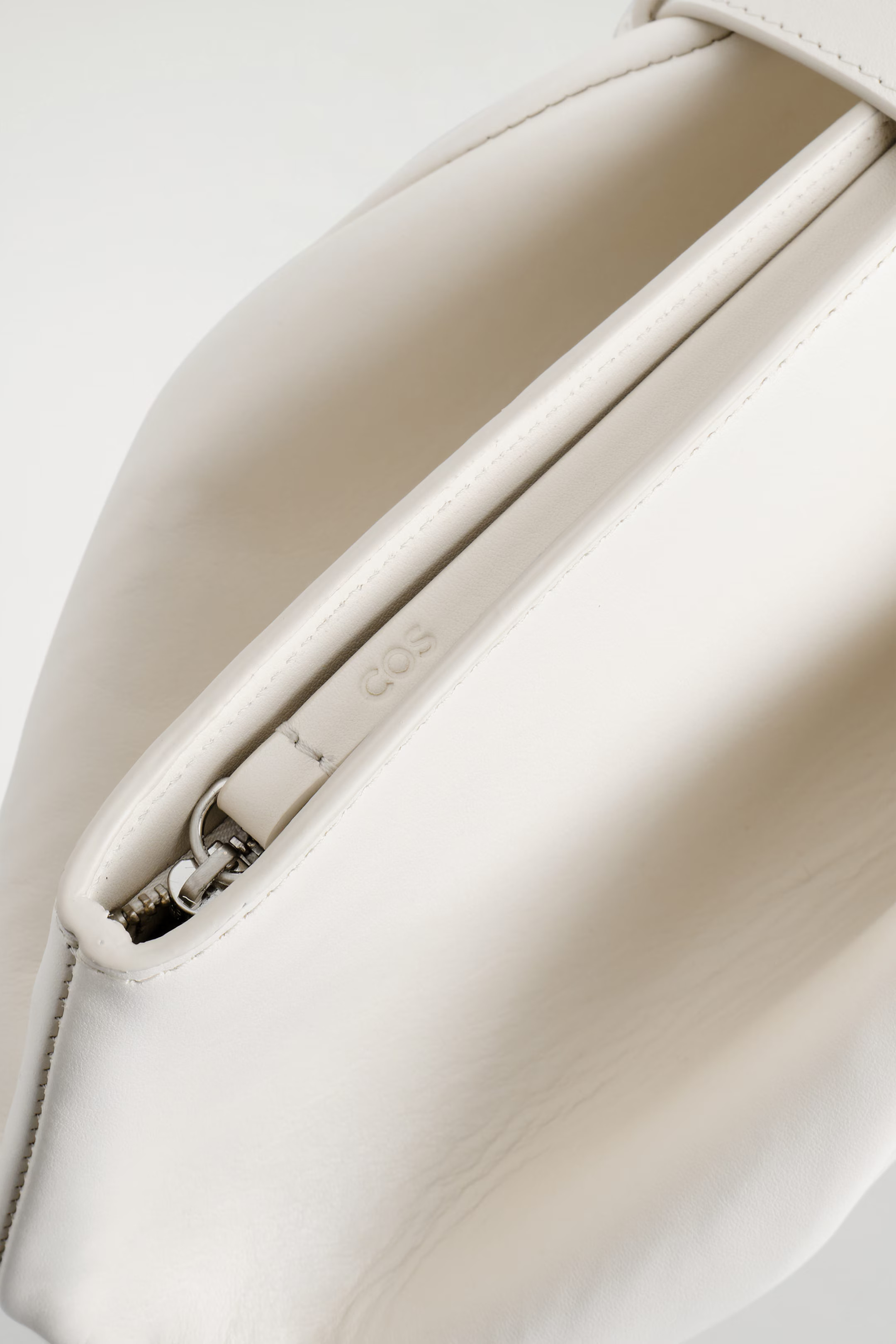 BELTED CLUTCH BAG - LEATHER - CHALK | COS GB | COS UK