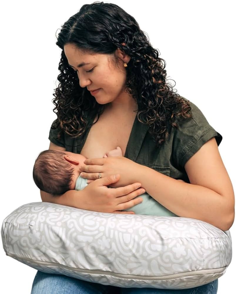 Boppy Nursing Pillow - Firm, Ergonomic U-Shaped Bottle and Breastfeeding Pillow with High Lift fo... | Amazon (US)