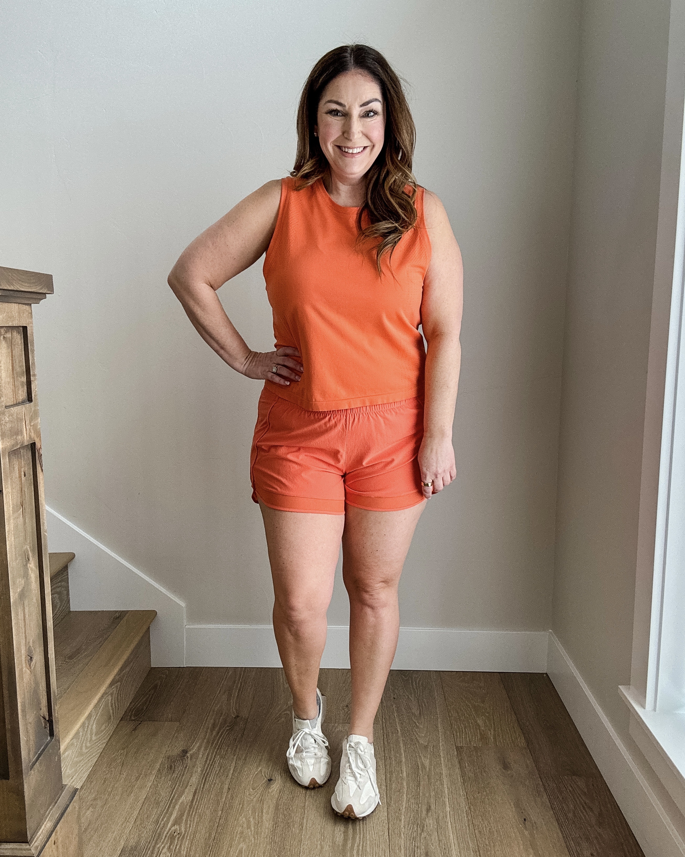 This Athleta orange tank and mesh race 4" mid rise short are such a fun summer color! Wearing L in both 

 

#LTKSeasonal #LTKActive #LTKMidsize