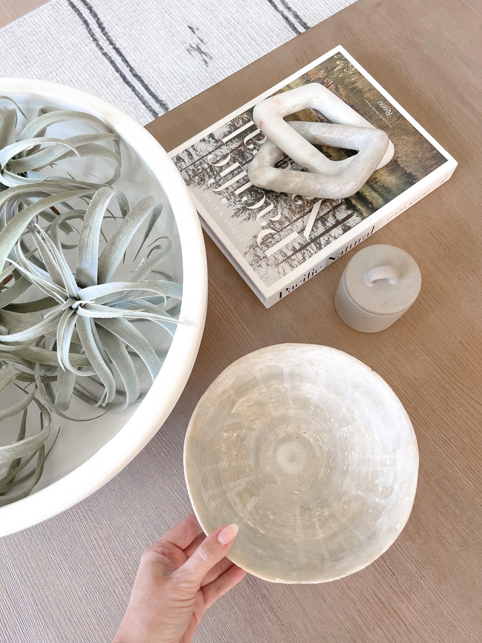 Coffee table styling with the perfect spring decor! 

Faux succulents, marble links, coffee table books, decorative bowl, pottery barn home decor

#LTKSeasonal #LTKhome #LTKFind