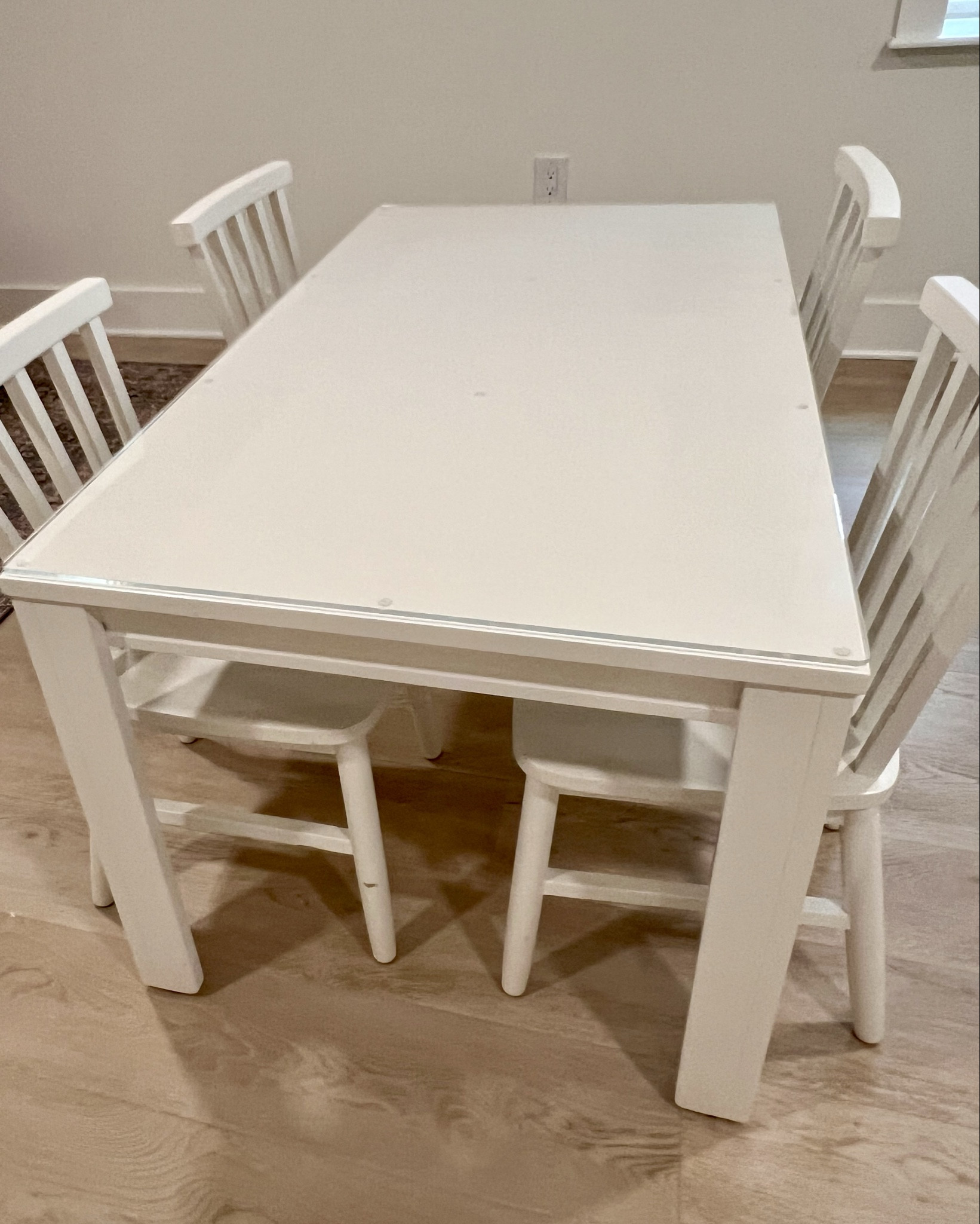 We’ve been using this table and chairs set daily for over three years, and it’s been an amazing addition to our playroom! Our white kids’ table is perfect for everything—Play-Doh, Legos, snacks, coloring, and even “playing school.” Adding the acrylic topper was the best decision—it’s saved our table from countless spills and scratches. I can’t believe how discounted the entire set is! I just replaced the acrylic topper for the first time, and honestly, you can’t beat the price. Highly recommend!

#LTKKids #LTKHome