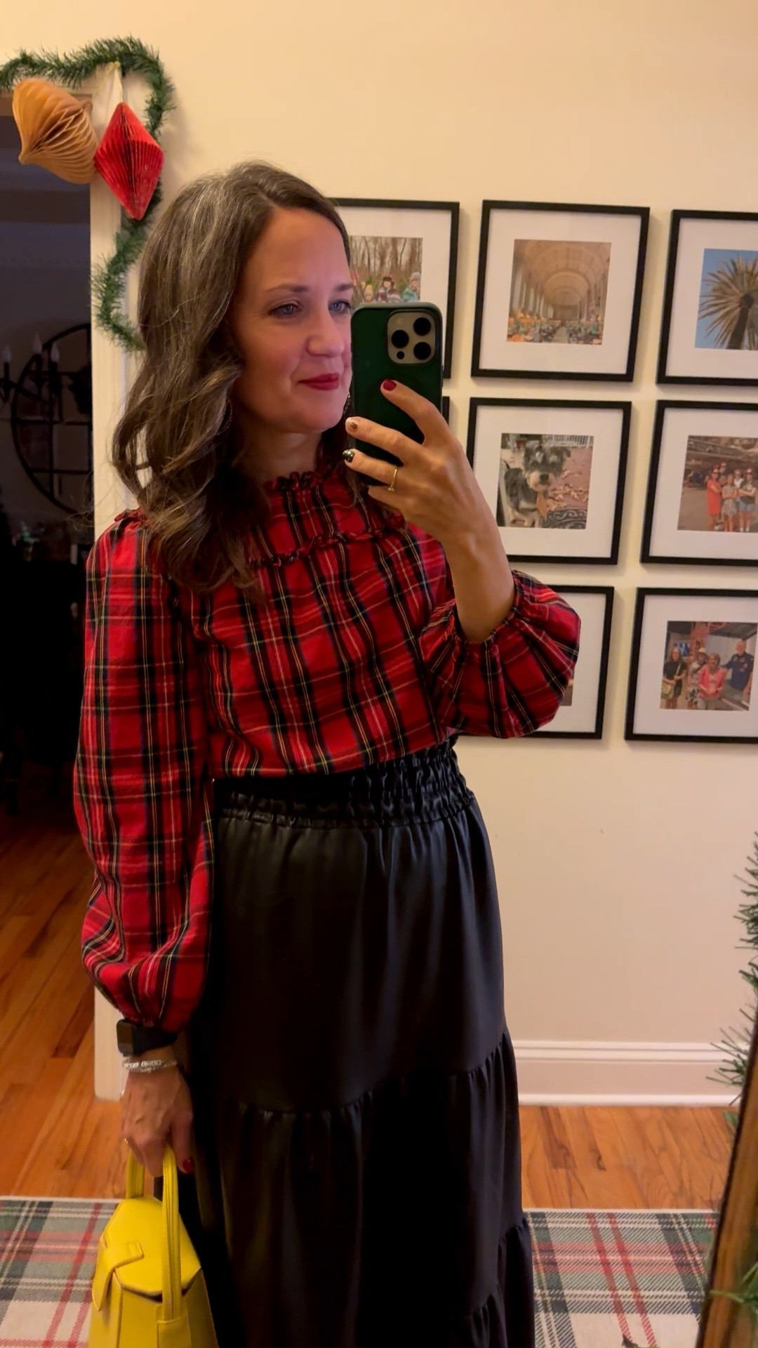 Holiday night out! Christmas plaid J.Crew blouse with a faux leather maxi skirt from Anthropologie and Sorel lug sole boots. 

#LTKHoliday #LTKOver40 #LTKSeasonal