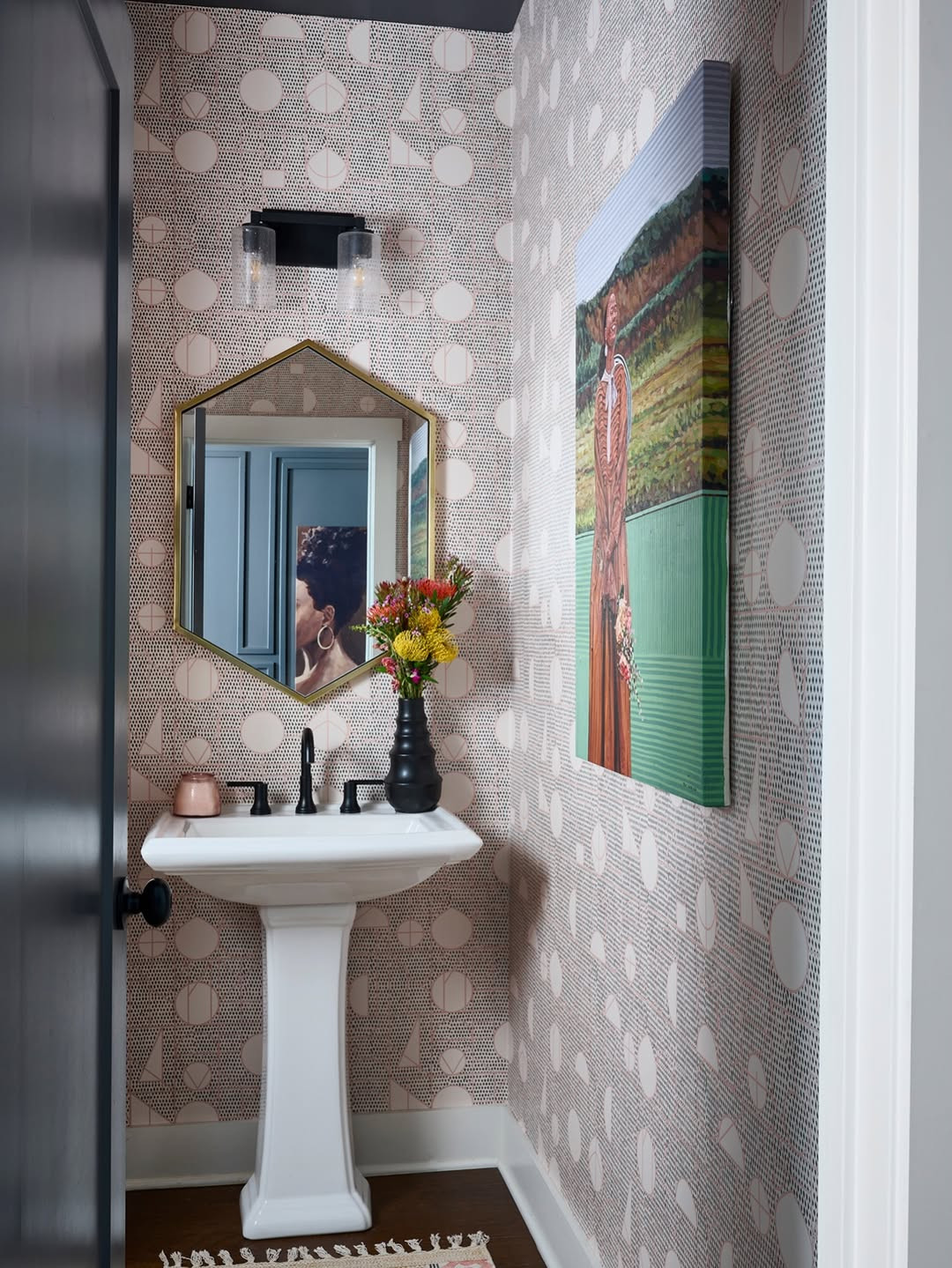 Subtle changes in this new construction powder bathroom did the trick. There’s nothing a little pattern, paint, and art can’t solve. Three years later, she’s still perfect. 💛 #ProjectBlackRenaissance

📸: @mm_photo_inc
💐: @joshuaholcombe
🖼️: @felix_icyiza 

 #LTKHome