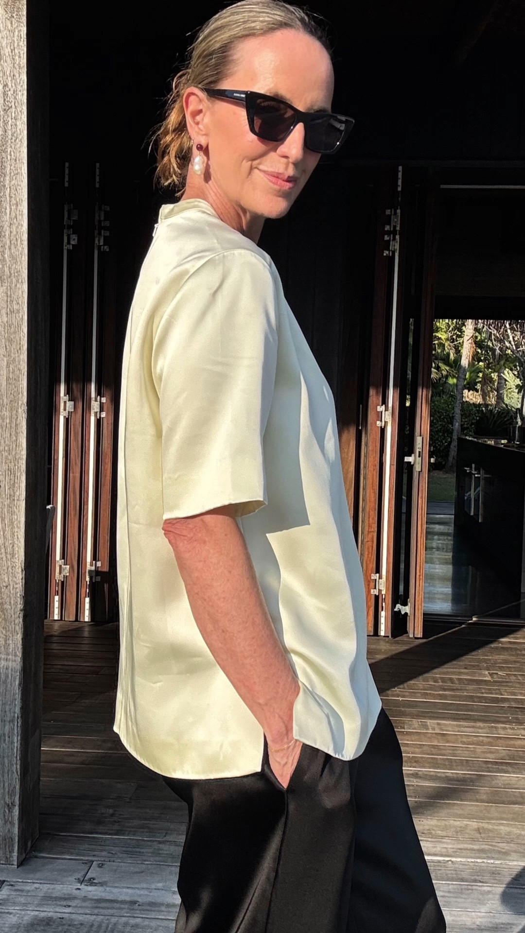 I like to dress up in a relaxed way for dinner on resorts (I mostly just wear a swimsuit and a tee during the day so I like to make an effort for the night!). I really love this heavy satin tee and pant from Oroton. I love the ease of the shapes and also the versatility- you could easily do the pant with a cotton tank during the day and switch in the satin tee for night along with a nice earring and bag!

#LTKaustralia #LTKtravel #LTKstyletip