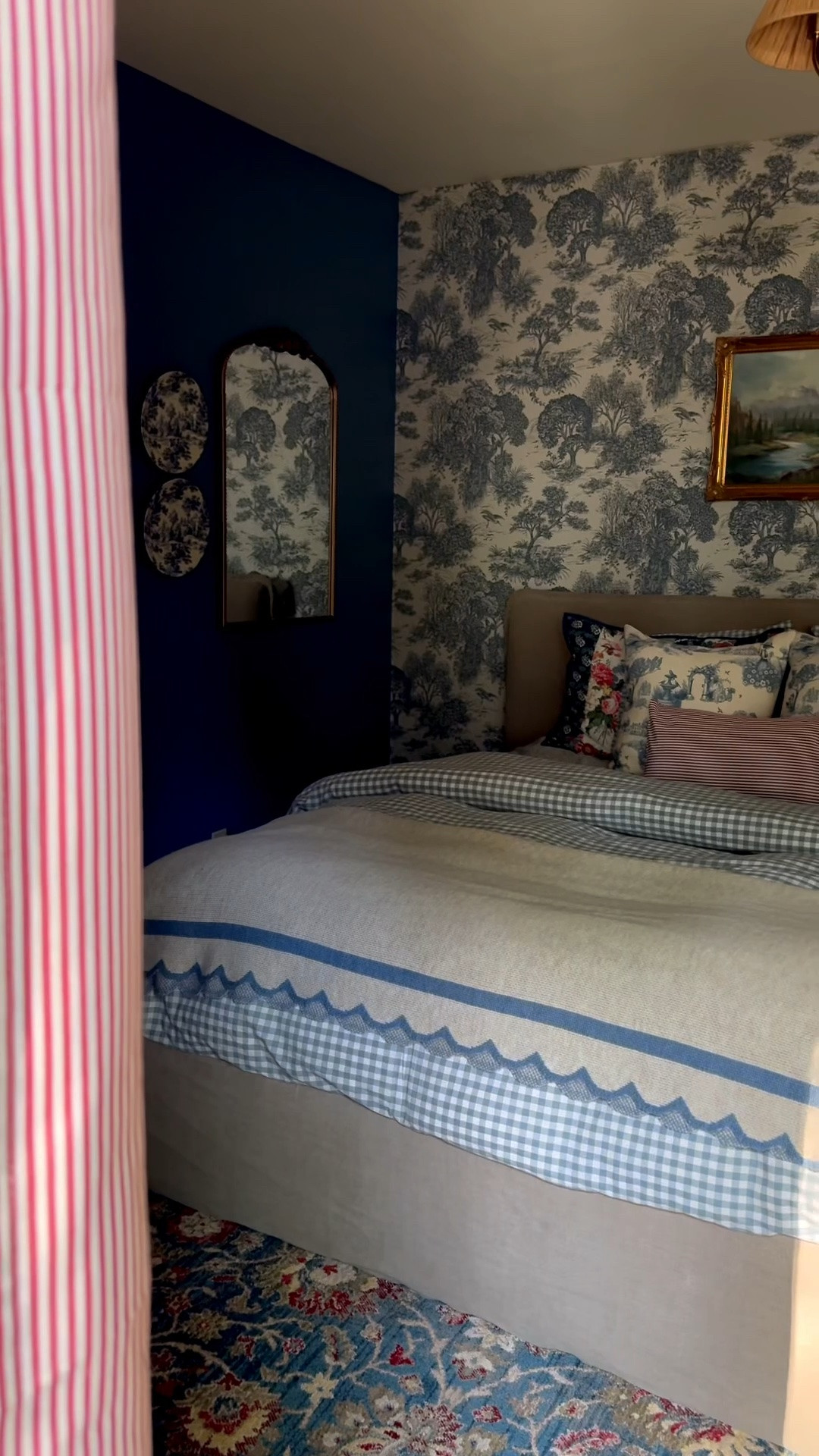 Custom red stripe pinch pleat curtains with blackout lining, custom bronze curtains rod with matching rings, custom toile pillow covers, blue toile pillows all from TwoPages

#LTKHome #LTKSaleAlert #LTKSeasonal