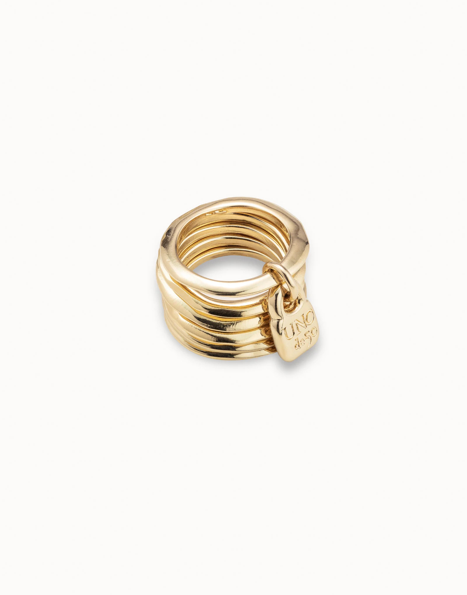 Multi row ring with a charm | UNOde50
