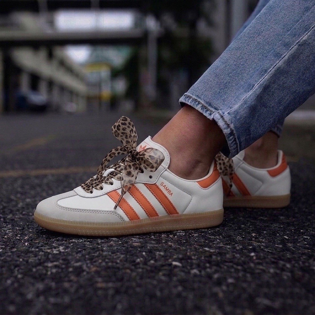 Adidas samba orange sneakers run true to size. Changed the laces for $10!