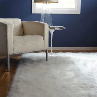 http://www.overstock.com/Home-Garden/Jungle-Faux-Sheep-Skin-White-Shag-Rug-76-x-96/10373187/product. | Bed Bath & Beyond