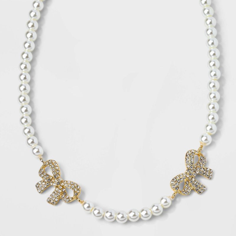 SUGARFIX by BaubleBar Pearl and Bow Statement Necklace - Gold/white | Target