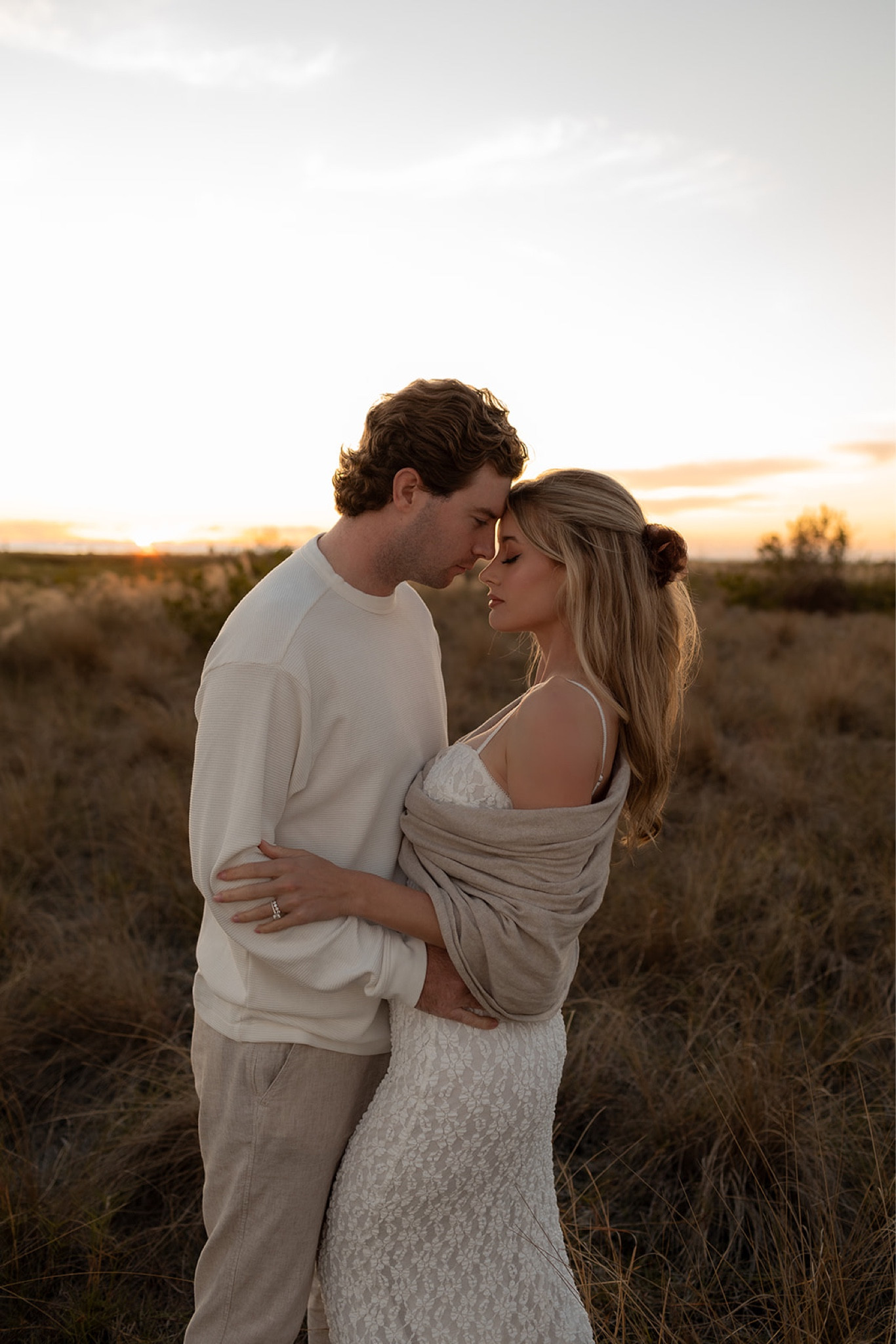 Couple photos. Couple beach photos. Wedding photos. Engagement photos. Anniversary photos. Florida engagement photos. Beach Engagement Photos. White dress. Men’s white shirt. Men’s linen pants. Women’s sure. Women’s beige wrap. Women’s sweater. 

#LTKTravel #LTKWedding #LTKFamily