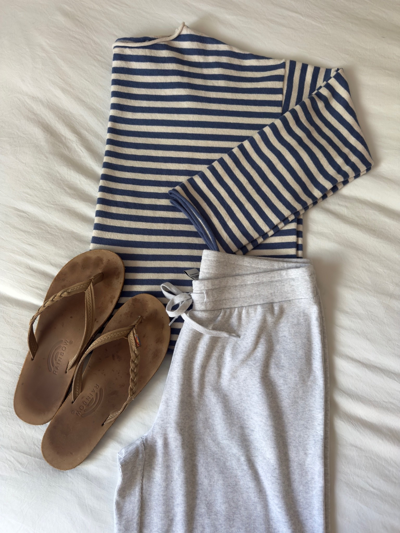 Striped Aerie sweater + homestretch pants! I sized down in the sweater for a less boxy fit 

#comfyoutfit #casual #summer #rainbowflipflops #aerie #aritzia #stripes #navy #coastal #aesthetic

#LTKootd #LTKSeasonal