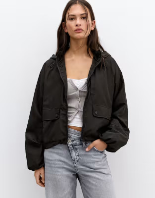Pull&Bear Short lightweight jacket with hood in black | ASOS (Global)
