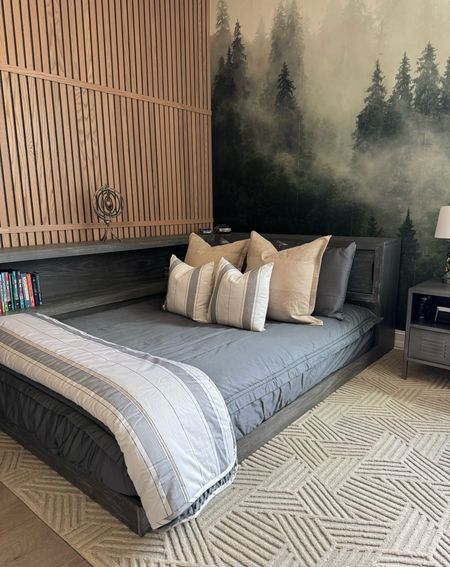Lots of questions about my sons bed! I love that it has storage and it also has a built-in outlet and USB plug. 

Pottery barn teen, storage bed, low profile bed, teen boy bedroom, Loloi rug, neutral rug, geometric rug, locker nightstand, forest wallpaper 

#LTKKids #LTKHome
