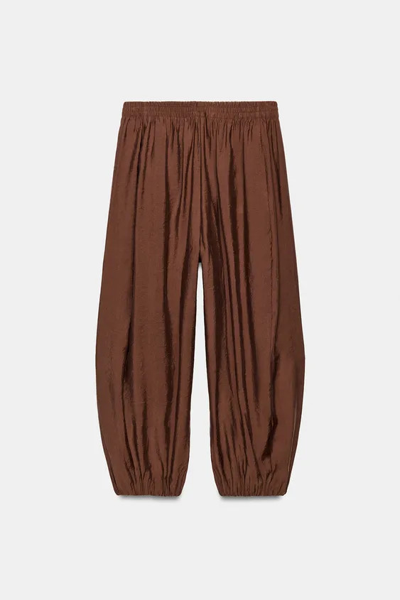 Mid-rise pants with an elastic waistband. Front pockets. Voluminous legs with elastic cuffs. | Zara Canada