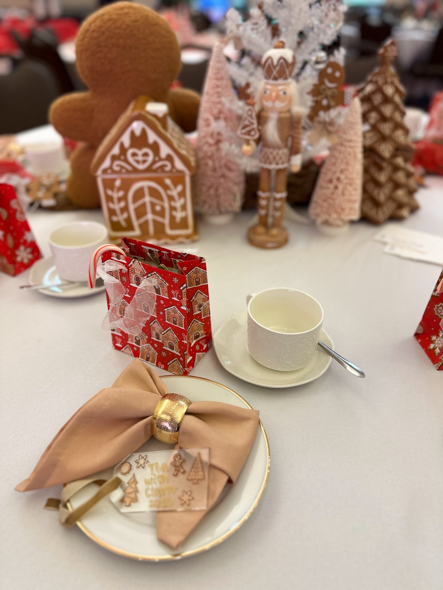 Gingerbread themed table for a Nutcracker cast Tea Party. Love doing the bow napkins, really adds detail to your table for hosting! Gingerbread items are from hobby lobby! #LTKGiftGuide #LTKSeasonal #LTKdayinmylife

#LTKmomlife #LTKKids #LTKHoliday