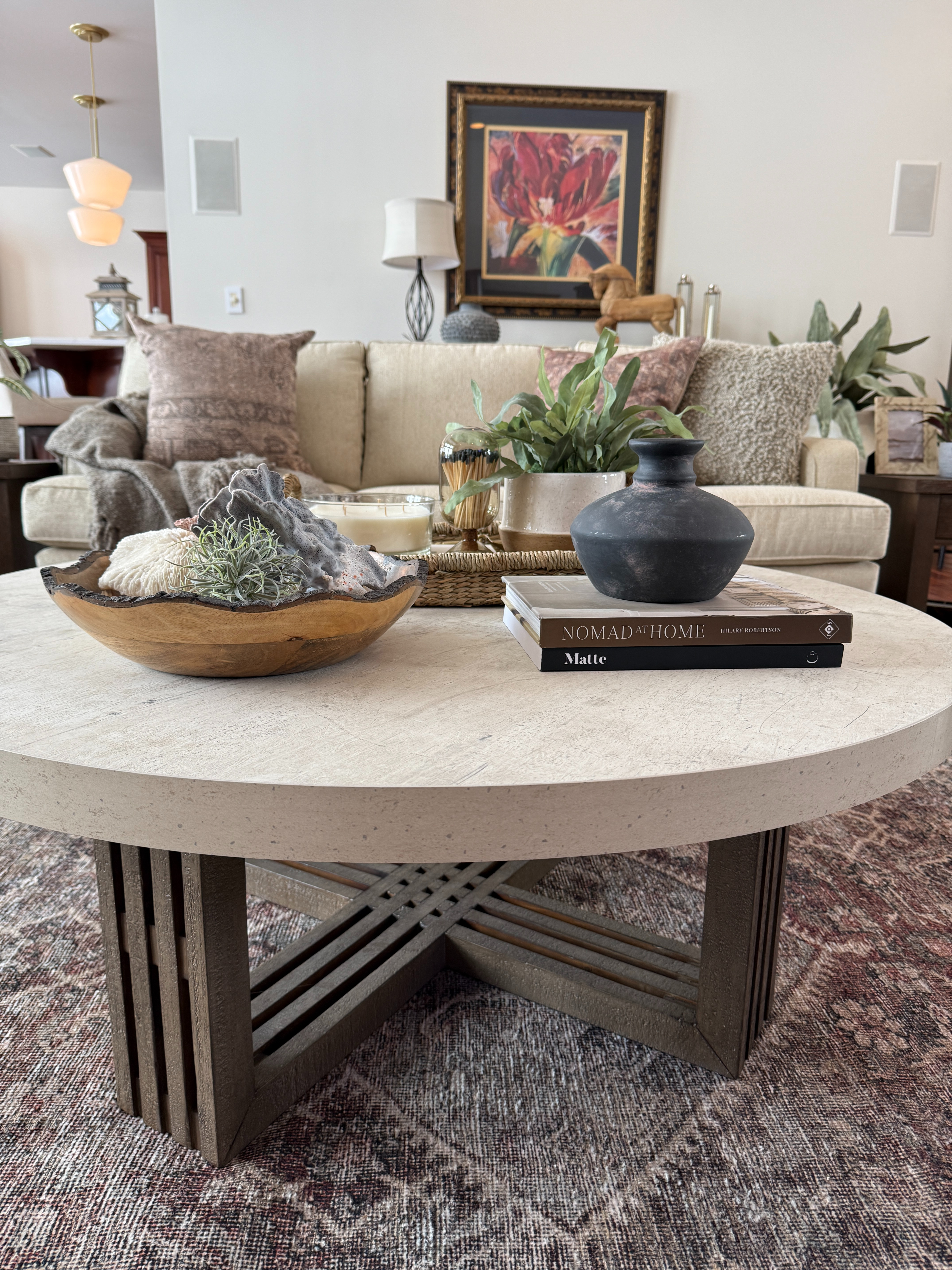 We source a lot of coffee tables in our design projects and we're always on the lookout for standout styles. 

This round style checks a lot of boxes - the mix of concrete and wood create balance and visual appeal. The geometric pattern of the base adds even more character and interest. 

Sharing a few additional elements that went into this room to complete the space.  

 #LTKHome