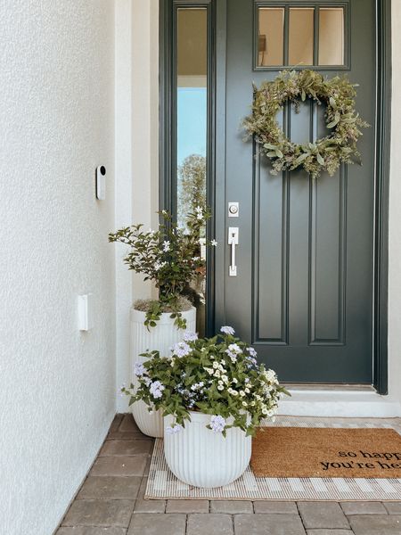 Outdoor fluted planters, spring front porch, white planters. 

#LTKSeasonal #LTKhome