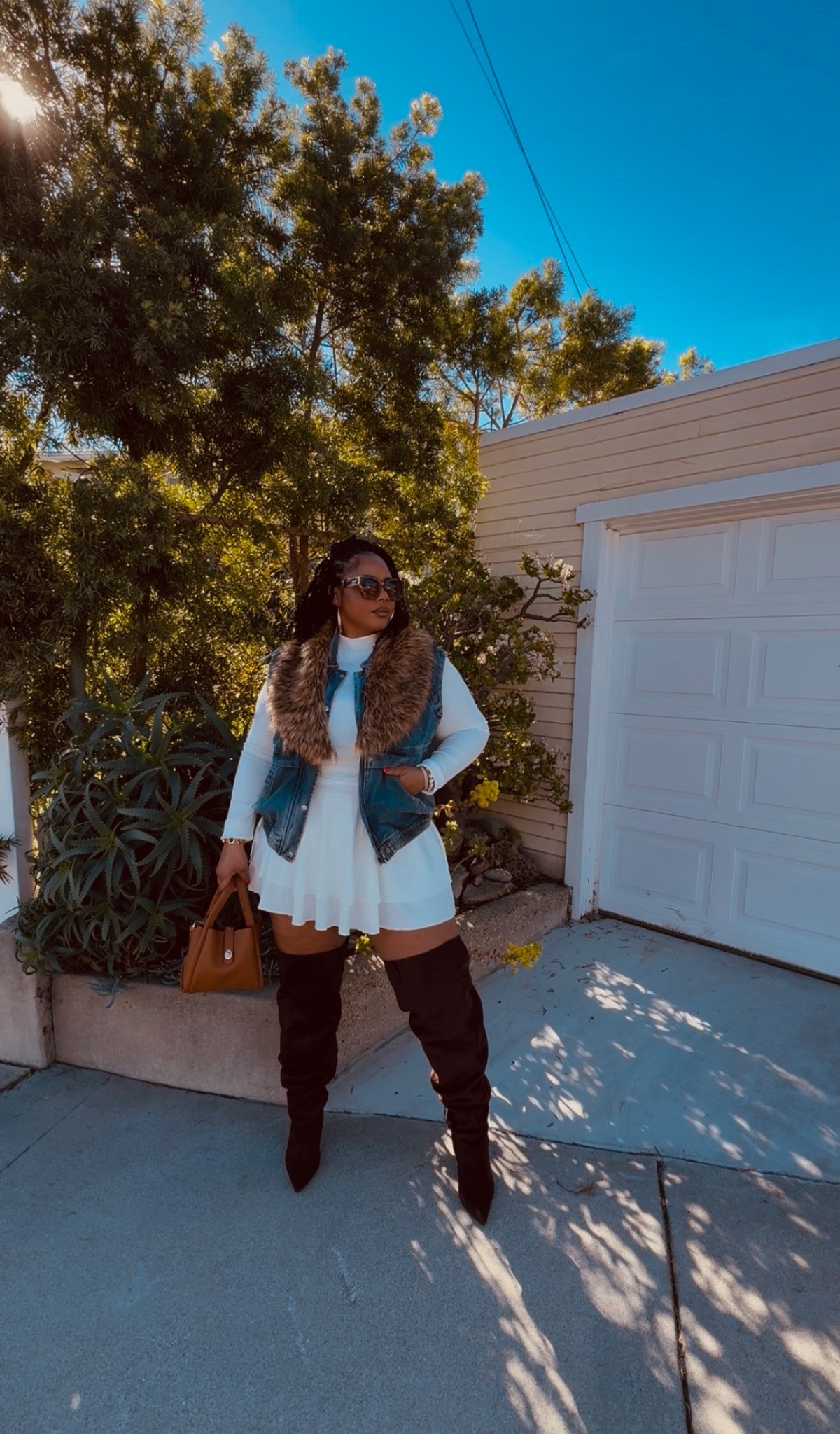 Fun flirty long sleeve white dress. Date night, girls night/ day . Im wearing a XXL the vest is old from fashion nova. And so is the fur collar. I wil ll try and link some similar 