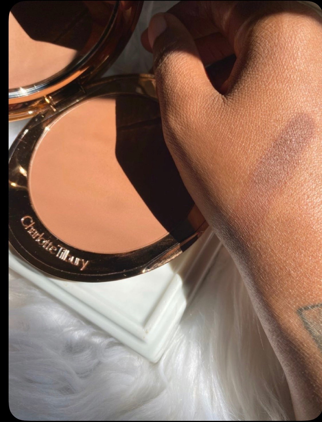 One of the world’s greatest bronzers for deeper skin tones! This is the Airbrush bronzer by Charlotte Tilbury, and it does exactly what it’s supposed to. It warms up the entire face and makes you look lightly bronzed by the sun. Not contoured, not heavy, not cakey. Just the warm glow you get from a day at the beach. 

I love this one for its texture, softness on the skin and the fact that it actually has the depth to bronze skin as deep as my skin tone AND deeper. So worth it, there are four shades that stretch to fit a multitude of skin tones. There’s also a refill so you don’t have to keep buying new packaging each time. Sincerely genius. ✨ 

I’m linking this directly from Charlotte Tilbury’s website and Ulta if you want a local option. ♥️

#LTKmomlife #LTKBeauty #LTKselfcare