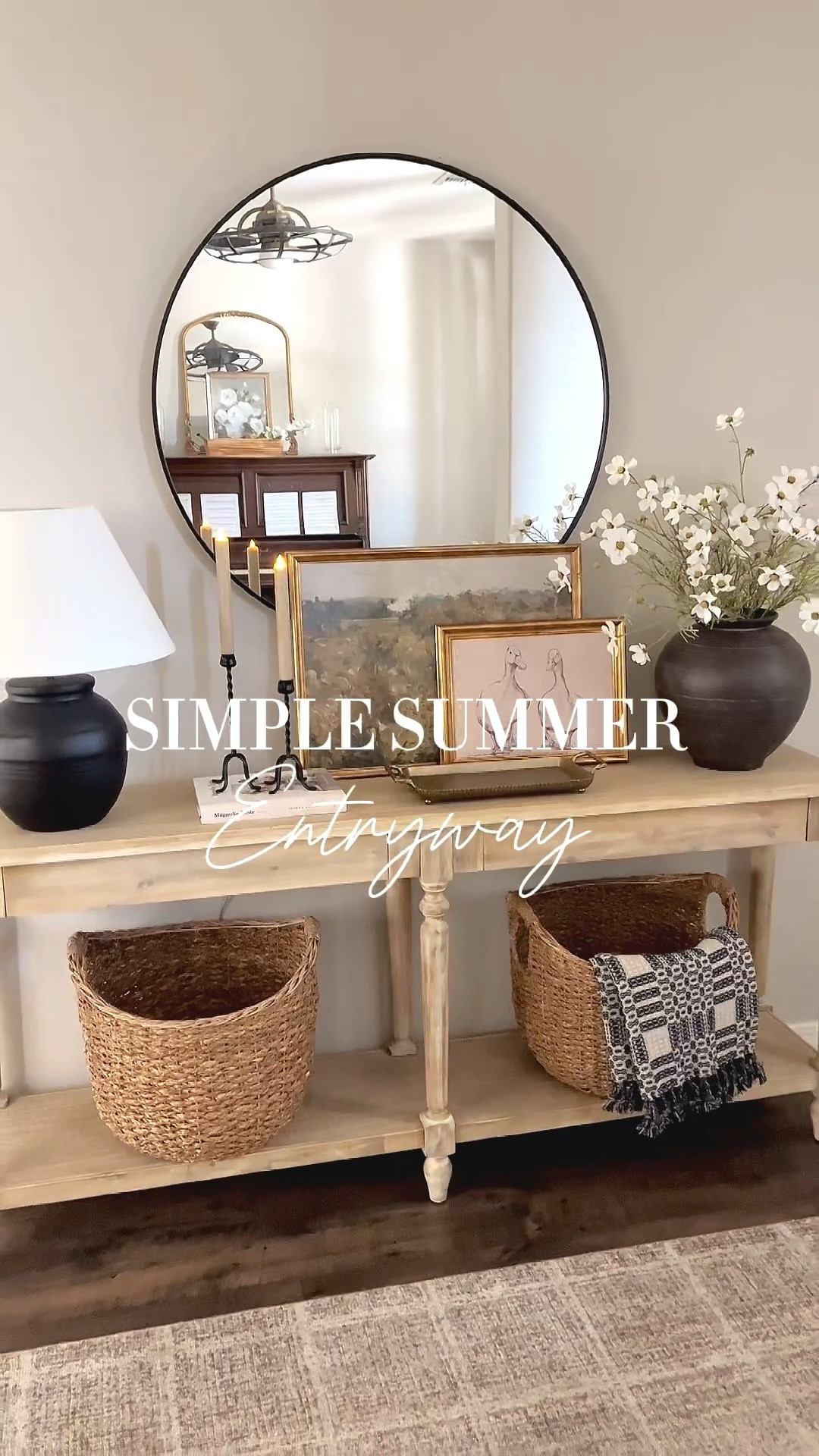 Simple summer entryway styling!  Summer florals, iron candle holders, beautiful artwork including a landscape scene and more adorable ducks to go with the ones on my porch. Baskets and a beautiful navy and neutral summer throw to complete the look!

#homedecor #entrywaystyling #entrywaydecor #summerdecor

#LTKSeasonal #LTKHome #LTKmomlife