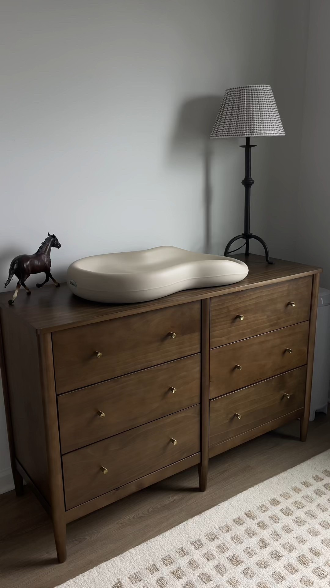 Nursery dresser | brown dresser | brown dresser with gold knobs | keekaroo changing pad | nursery rug | drawer organization

#LTKBaby #LTKBump #LTKHome