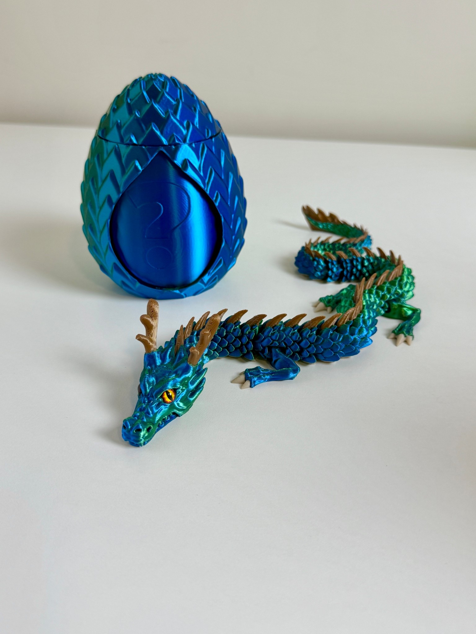🐉 This is a big hit for my boys right now! Such a fun gift idea for kids or anyone who loves dragons or fantasy!

This 3D printed dragon toy comes inside a mystery egg with a question mark on the outside, and the surprise reveal is the best part. You twist the top of the egg to open it and the dragon is inside waiting. That moment was a huge hit for both my 5th grader and my kindergartener. 🤯✨

The dragon is fully articulated, flexible, and works as a fidget too. Perfect for desk play, sensory play, and imaginative play. Screen-free, satisfying, and genuinely cool. 👏

Such a great gift for boys, stocking stuffer idea, or fun surprise for kids who love dragons, fidgets, and mystery toys. 🎁🔥

🔍 toys for boys, gifts for girls, bookish gifts, gifts for boys, dragon toy, 3D printed dragon, mystery egg toy, fidget toys for kids, sensory toys, STEM toys, screen free toys, gifts for kids, Christmas gifts for boys, stocking stuffers for boys, unique toys for kids, cool toys for kids, toy gift ideas, birthday gifts for boys, classroom prize ideas, desk toys, surprise toys, Amazon toy finds, kids gift ideas 



#LTKFindsUnder50 #LTKKids #LTKSaleAlert