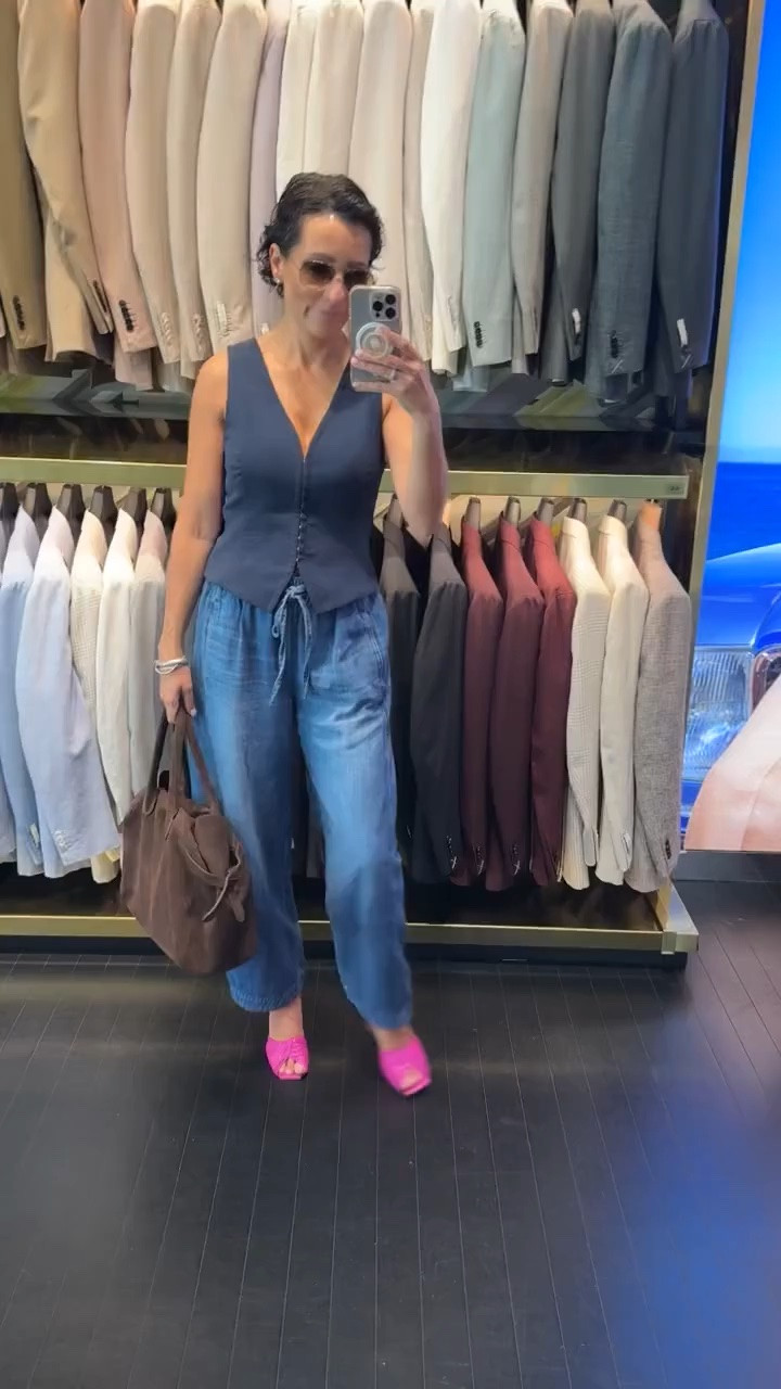 A navy vest and relaxed denim is such a good fall formula, especially on those warmer days when you’re ready for the season but not quite ready for layers. I love adding bright pink heels for an unexpected pop of color that gives these classic pieces a little more personality.

navy vest outfit, fall denim outfit, relaxed jeans, pink heels, early fall outfit, women over 50 style, fall outfit ideas, elevated casual style, transitional fall fashion, stylewitheugenia

#LTKootd #LTKSeasonal #LTKOver40