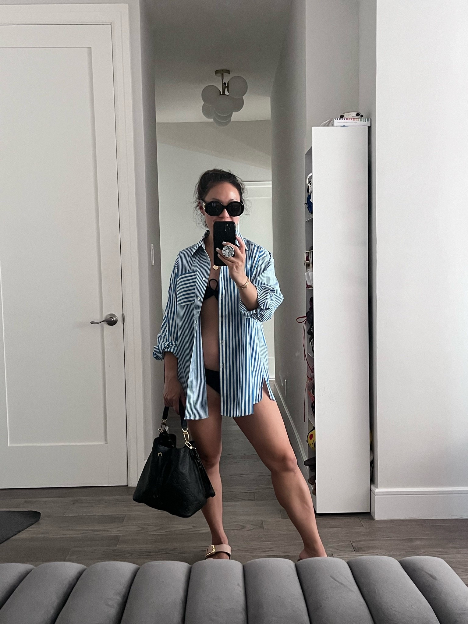 Stripe shirt. Oversized. Doubles as a cover-up. I’m wearing an xs.

#LTKSwim #LTKActive #LTKmomlife