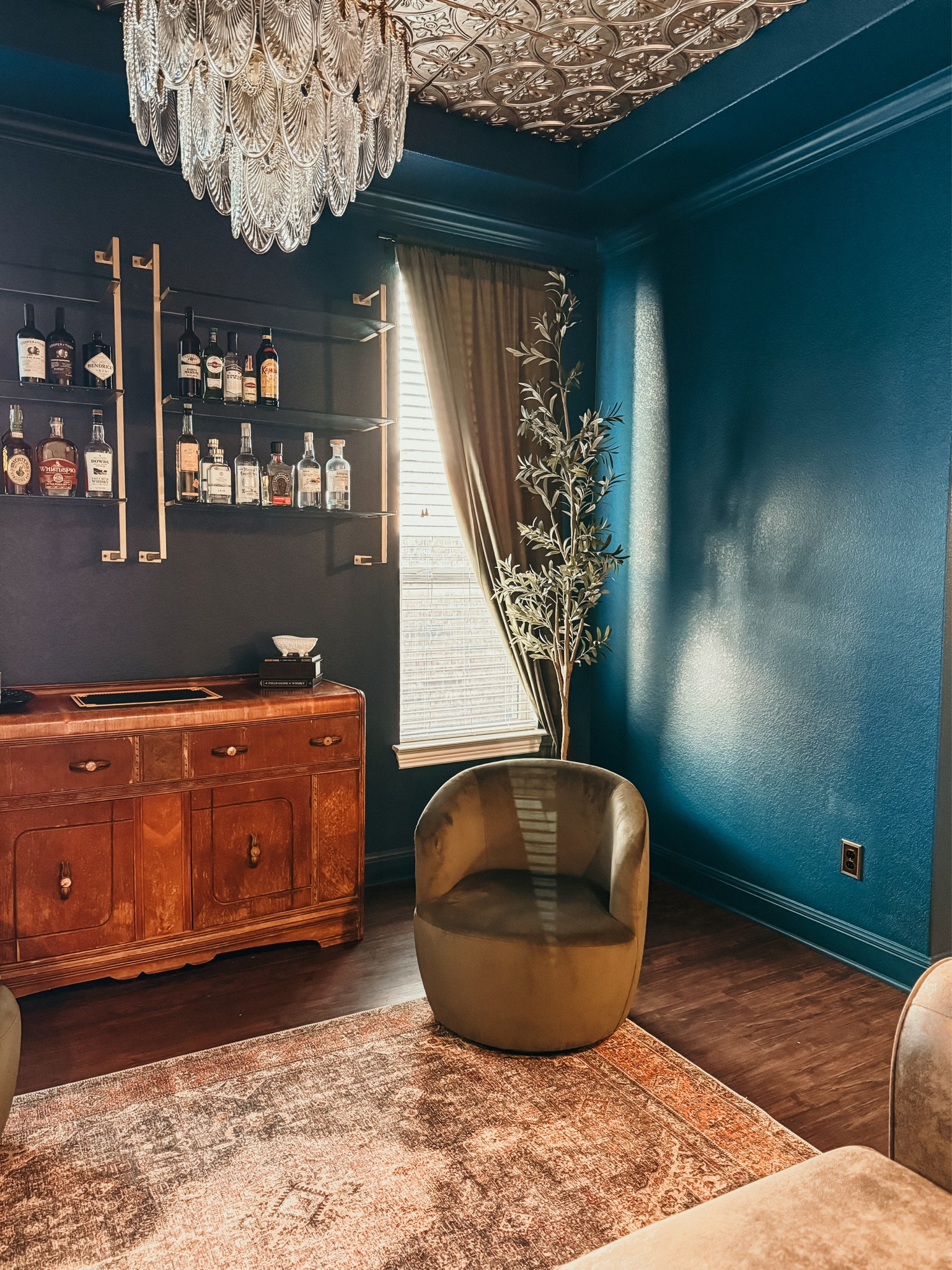 Made our formal dining room into a speakeasy lounge for about 2k plus paint! 

This is definitely going to be the best for hosting this holiday and is my new favorite room! 😍🙌🏼🥃

#whiskey #speakeasy #lounge #holiday2025 #entertaining #roomeredo #diy 

#LTKCyberWeek #LTKSeasonal #LTKStyleTip