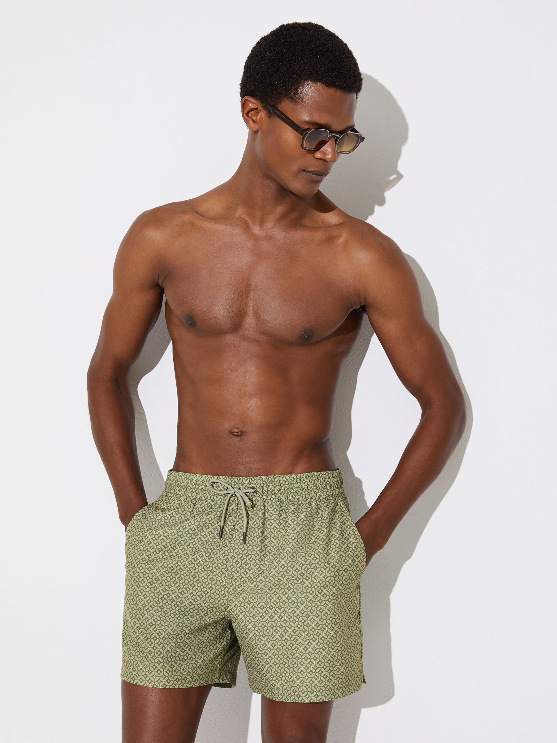 Reiss Geometric-Print Swim Shorts in Sage Green | REISS | Reiss US