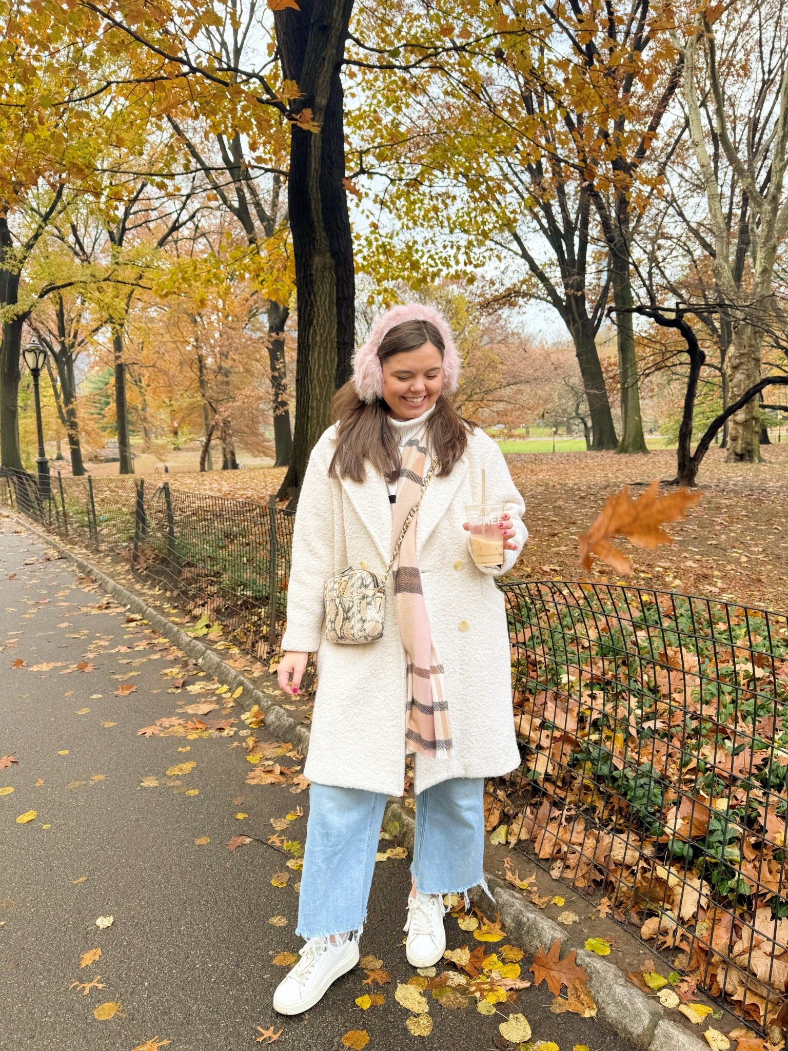 Central Park outfit 😍 Loving this classic white peacoat with the pink fuzzy ear muffs! 

#LTKSaleAlert #LTKootd #LTKSeasonal