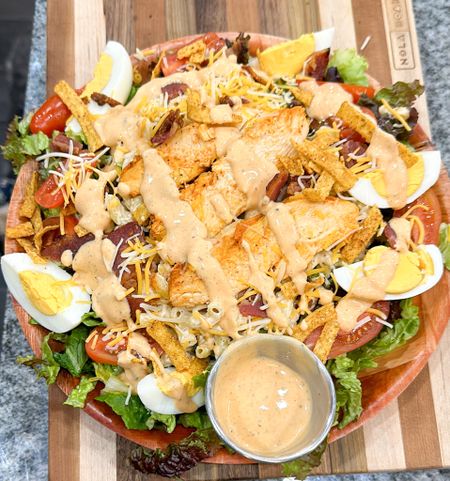 I love wooden plates. Serving my Buffalo chicken salad on this wooden plate. So yummy and I love the look. 🥗 #Salads #BuffaloChicken #Kitchenware #WellnessWednesday #Home #Homecook #AtHomewithDSF 