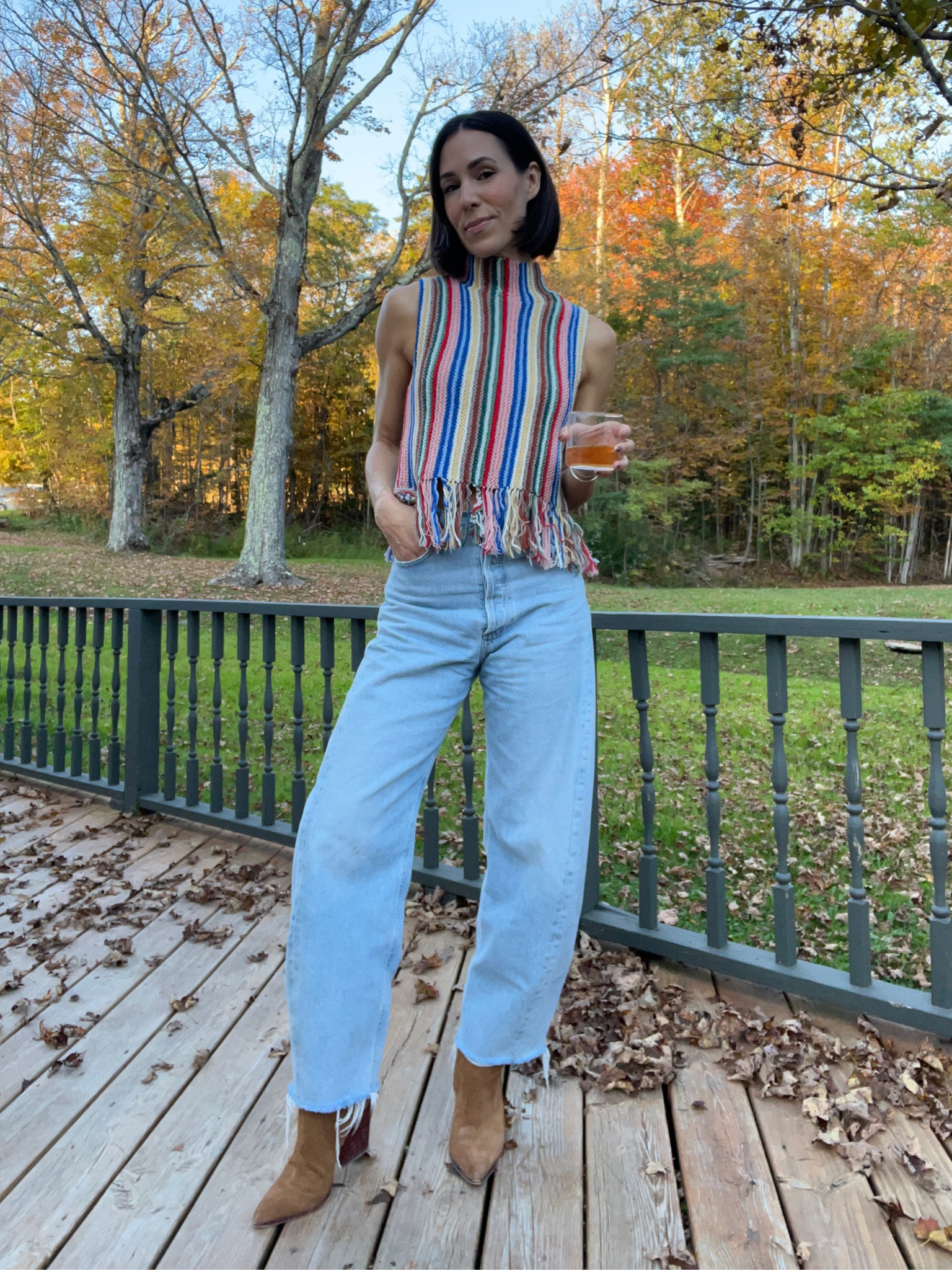 Feeling like fall in the Catskills! Wearing this adorable sweater tank, jean and bootie combo!

#LTKstyletip