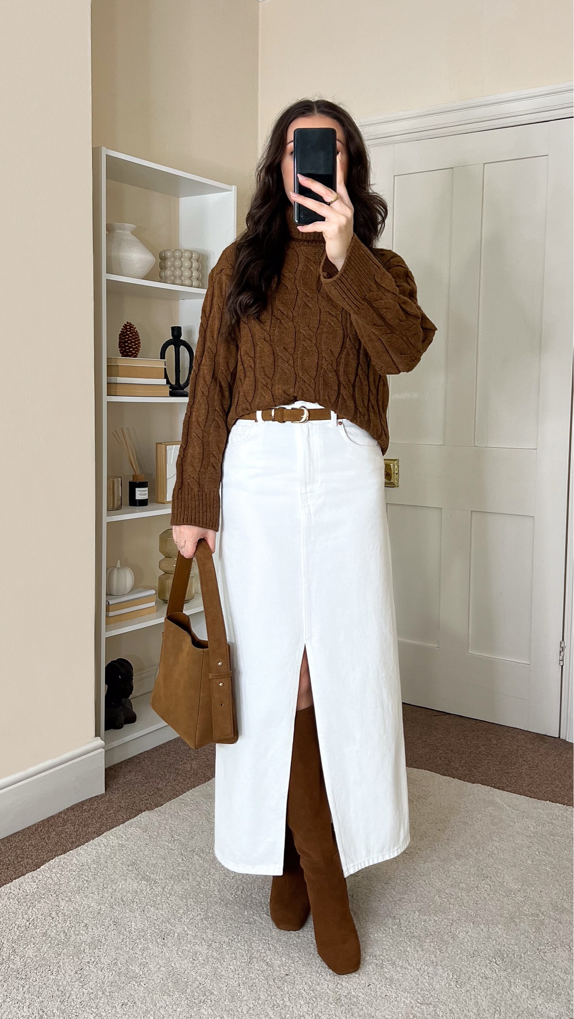 Casual chic early winter outfit. Jumper is M&S, wearing size S. Skirt is Mango, wearing size S. Boots are Sam Edelman. Bag is Mango.

#LTKstyletip #LTKCyberWeek #LTKwinter