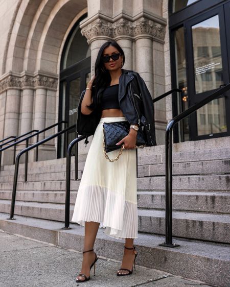 Casual spring outfit 
White pleated skirt wearing an XS
AllSaints leather jacket wearing a US 2
Black tube top under $30

#LTKfindsunder100 #LTKSeasonal #LTKstyletip