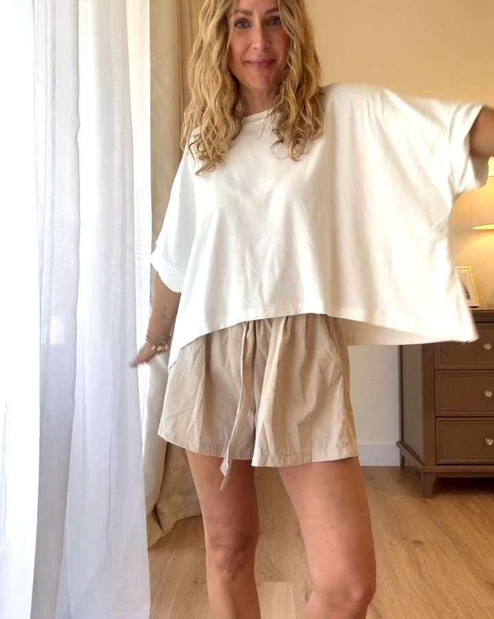 Already oversized so I’d buy TTS if you want it a bit big and comfy- I’m wearing a small here :) 