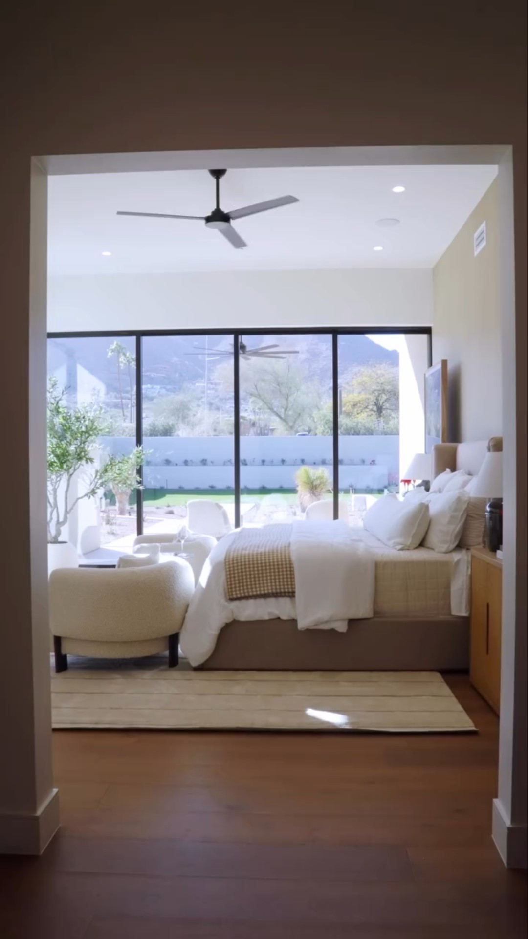 The primary bedroom at #suitandtie is a dream. 💭 
Sharing the ceiling fan!


Built by @traviscustomhomes 
Interior design + staging us @kozidesigner 
Developer @vasbinderdevelopment 
Video @kyle_bryce 

#interiors #interiordesign #homedesign #bedroomgoals #bedroomwithaview #mountainview #arizonadesign #paradisevalleyhome #bedroomdecor #bedroomfurniture #homedesign #homerenovation #interiordesignersofinstagram

#LTKHome